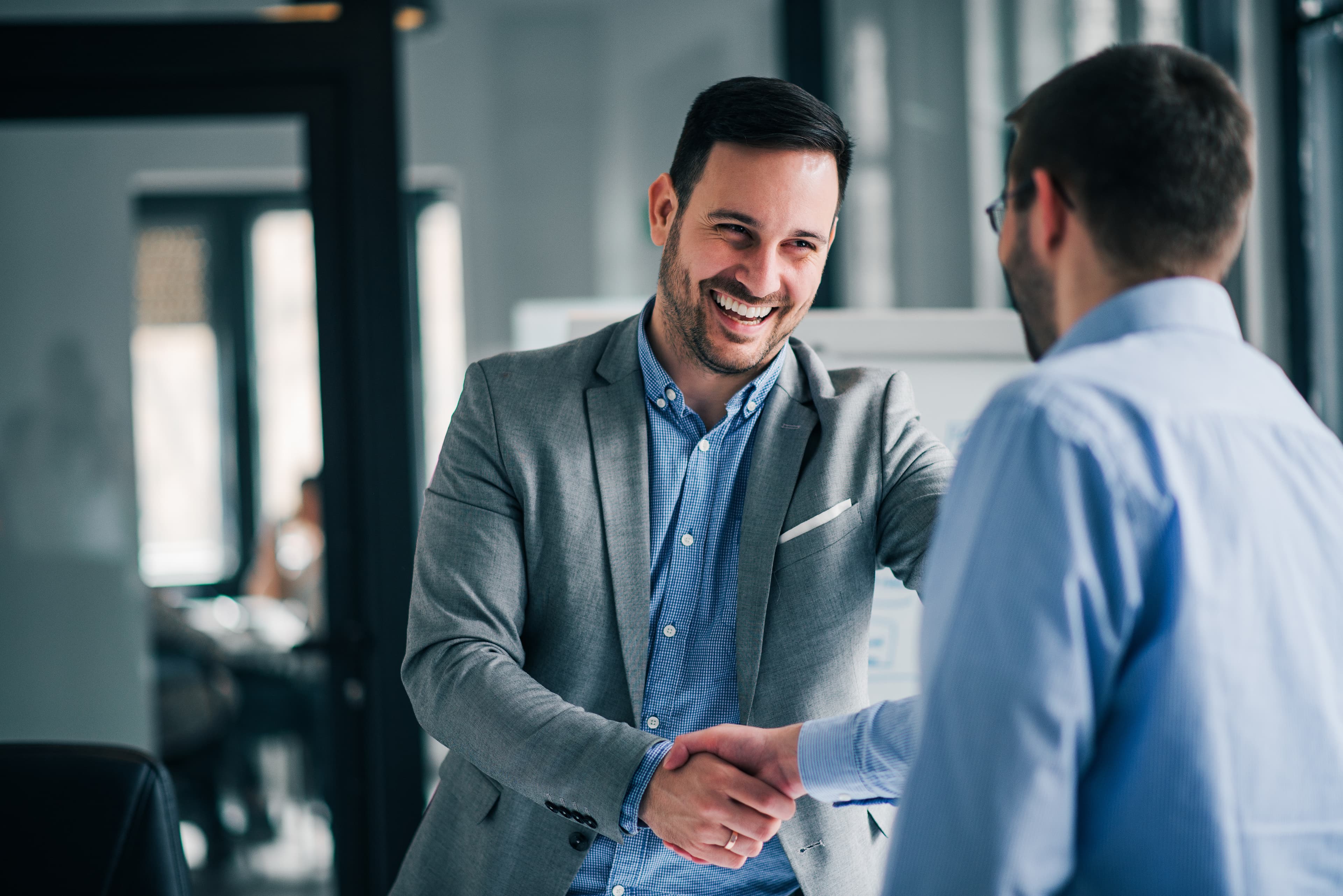 Two business leaders shaking hands
