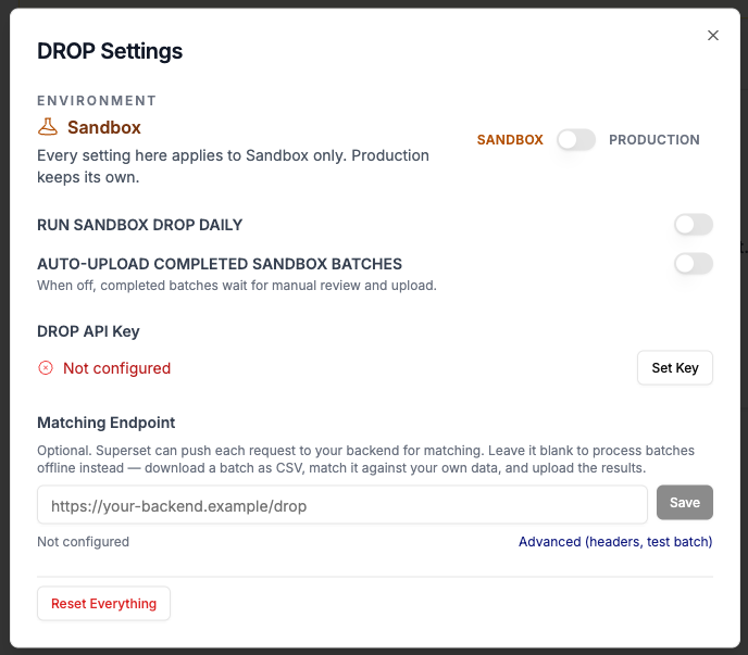 The DROP Settings popup in the Sandbox environment: toggles for Run Sandbox DROP Daily and Auto-Upload Completed Sandbox Batches, the DROP API Key with Set Key, and the optional Matching Endpoint field.